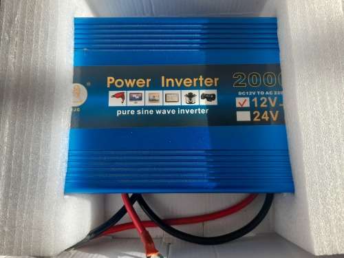 ***LOT OF OFF THE GRID SUPPLIES**2000W INVERTER(FAULTY), BATTERY CHARGER, NEW BATTERY, 12V LED LIGHT