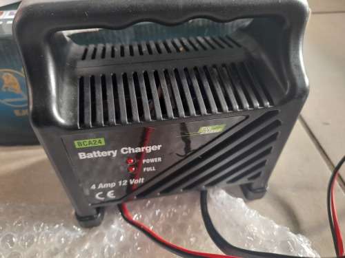 ***LOT OF OFF THE GRID SUPPLIES**2000W INVERTER(FAULTY), BATTERY CHARGER, NEW BATTERY, 12V LED LIGHT