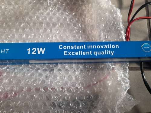 ***LOT OF OFF THE GRID SUPPLIES**2000W INVERTER(FAULTY), BATTERY CHARGER, NEW BATTERY, 12V LED LIGHT