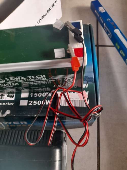 ***LOT OF OFF THE GRID SUPPLIES**2000W INVERTER(FAULTY), BATTERY CHARGER, NEW BATTERY, 12V LED LIGHT