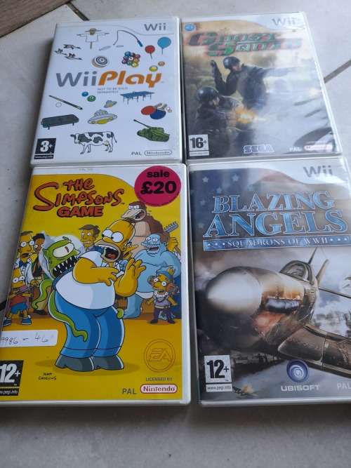 **CRAZY SPECIAL**NINTENDO WII CONSOL. STAND ,REMOTES,NUNCHUCKS,REMOTE GLOVES, GAMES, CABLES, ETC**