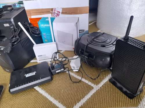 * STOCK CLEARANCE**BULK LOT OF UPS,ROUTERS,3G ROUTERS, RANGE EXTENDER,CD RADIO ETC**