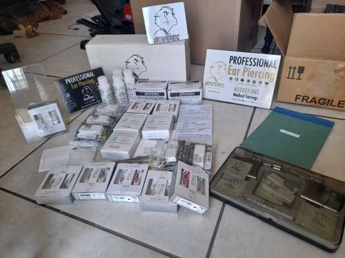 *LIQUIDATION*COMPLETE STUDEX BODY PIERCING BUSINESS*PIERCING GUNS,STUDS,IMDEMNITY FORMS,ETC ETC**
