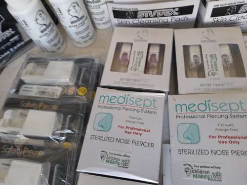 *LIQUIDATION*COMPLETE STUDEX BODY PIERCING BUSINESS*PIERCING GUNS,STUDS,IMDEMNITY FORMS,ETC ETC**