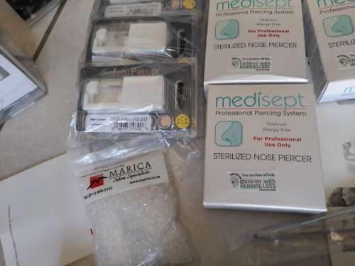 *LIQUIDATION*COMPLETE STUDEX BODY PIERCING BUSINESS*PIERCING GUNS,STUDS,IMDEMNITY FORMS,ETC ETC**