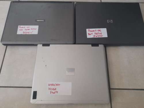**LIQUIDATION STOCK**BULK LOT OF 3X  LAPTOPS LAPTOPS*POWERING ON BUT SOLD AS IS**