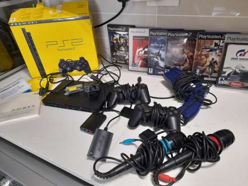 **SONY PS2 BULK COMBO DEAL**PS2 IN BOX WITH 6 GAMES, 2 CONTROLLERS,MICS,GUN,CAMERA EYE ETC***