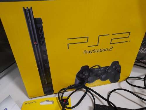 **SONY PS2 BULK COMBO DEAL**PS2 IN BOX WITH 6 GAMES, 2 CONTROLLERS,MICS,GUN,CAMERA EYE ETC***
