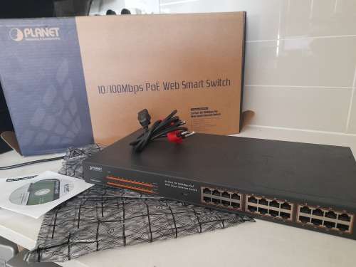 *CALLCENTRE LIQUIDATION*PLANET FNSW-2400PS 24 PORT 10/100 POE WEBSMART BUSINESS SWITCH*AROUND R15000