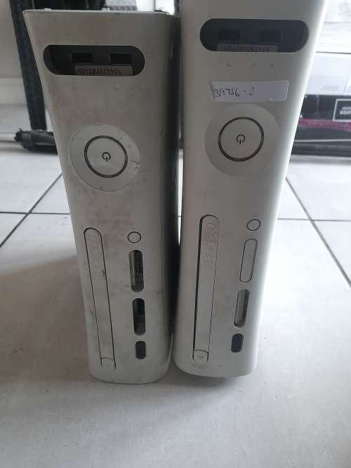 ***STORAGE CLEARANCE**2 X XBOX 360 CONSOLES*NOT TESTED NO POWER SUPPLY*ONE BID FOR BOTH**