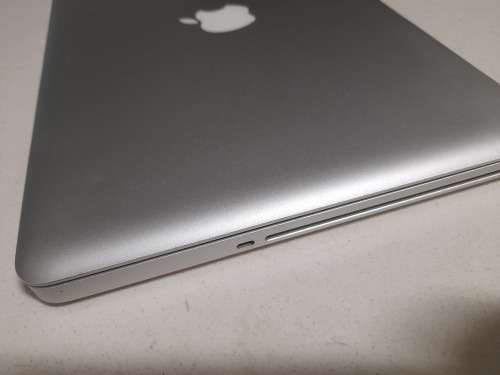 **MONTH END MADNESS*APPLE MAC BOOK PRO*NO CHARER NOT SURE SPECS*CRACKED SCREEN**