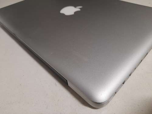 **MONTH END MADNESS*APPLE MAC BOOK PRO*NO CHARER NOT SURE SPECS*CRACKED SCREEN**