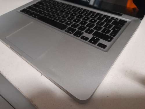 **MONTH END MADNESS*APPLE MAC BOOK PRO*NO CHARER NOT SURE SPECS*CRACKED SCREEN**