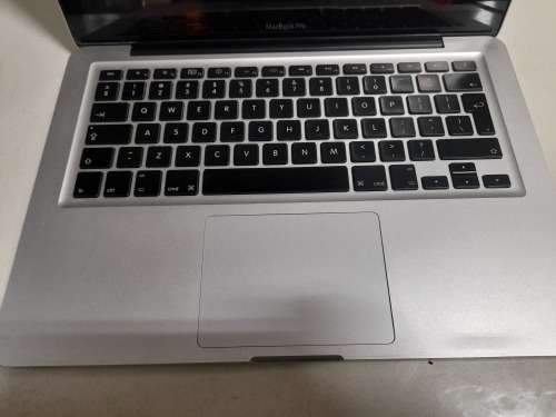 **MONTH END MADNESS*APPLE MAC BOOK PRO*NO CHARER NOT SURE SPECS*CRACKED SCREEN**