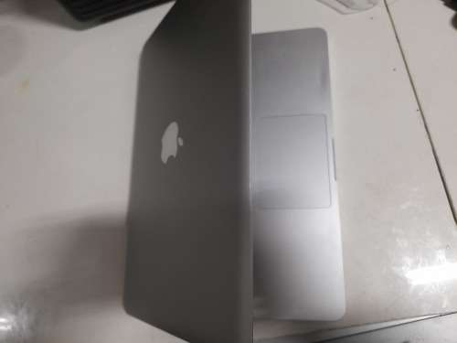 **MONTH END MADNESS*APPLE MAC BOOK PRO*NO CHARER NOT SURE SPECS*CRACKED SCREEN**