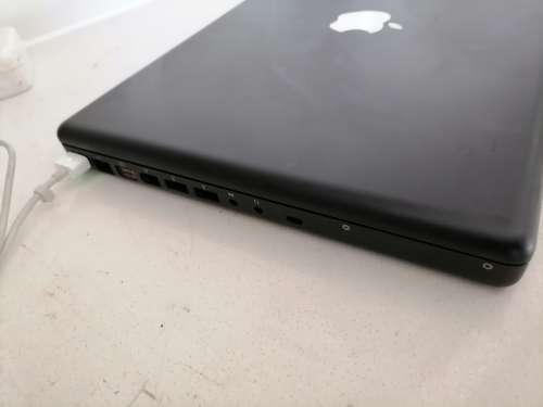 *DONT MISS THIS DEAL*LIQUIDATION ITEM**APPLE MACBOOK A1181 LAPTOP WITH CHARGER POWERS ON NEEDS RESET