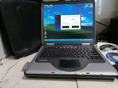 **COMPAQ PRESARIO 2500 WITH WIFI CARD,DISKS,POWER SUPPLY,BAG*OLD BUT WORKING AND BATTERY GOOD+SPARE*