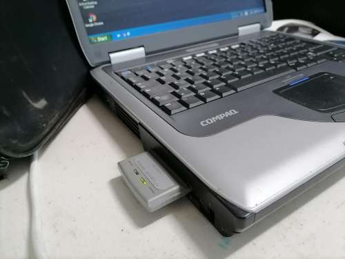 **COMPAQ PRESARIO 2500 WITH WIFI CARD,DISKS,POWER SUPPLY,BAG*OLD BUT WORKING AND BATTERY GOOD+SPARE*