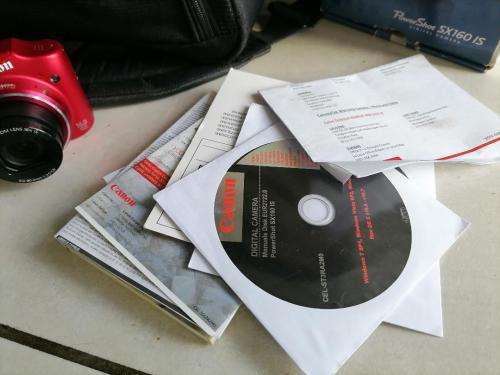 *YOUR CHRSTMAS PRESENT*RED CAON POWERSHOTSX150IS IN BOX AND BAG ,MANUALS, DISK,BATTRIES