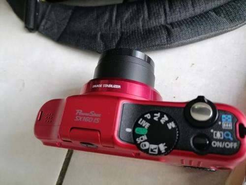 *YOUR CHRSTMAS PRESENT*RED CAON POWERSHOTSX150IS IN BOX AND BAG ,MANUALS, DISK,BATTRIES