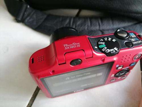 *YOUR CHRSTMAS PRESENT*RED CAON POWERSHOTSX150IS IN BOX AND BAG ,MANUALS, DISK,BATTRIES