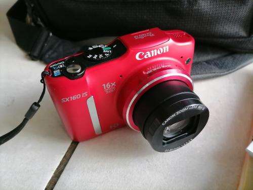 *YOUR CHRSTMAS PRESENT*RED CAON POWERSHOTSX150IS IN BOX AND BAG ,MANUALS, DISK,BATTRIES