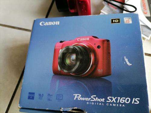 *YOUR CHRSTMAS PRESENT*RED CAON POWERSHOTSX150IS IN BOX AND BAG ,MANUALS, DISK,BATTRIES