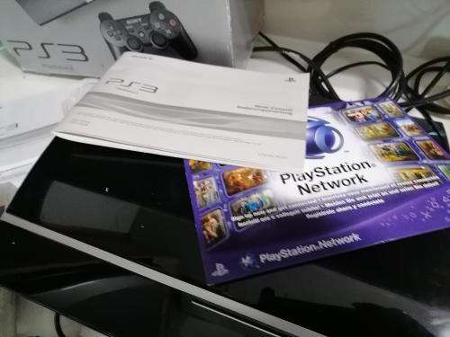 *PREOWNED SONY PLAYSTATION 3 IN BOX WITH 2 GAMES* 1 NEW WIRELESS REMOTE*1 USED REMOTE,MANUALS*