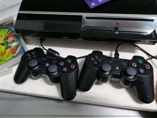 *PREOWNED SONY PLAYSTATION 3 IN BOX WITH 2 GAMES* 1 NEW WIRELESS REMOTE*1 USED REMOTE,MANUALS*