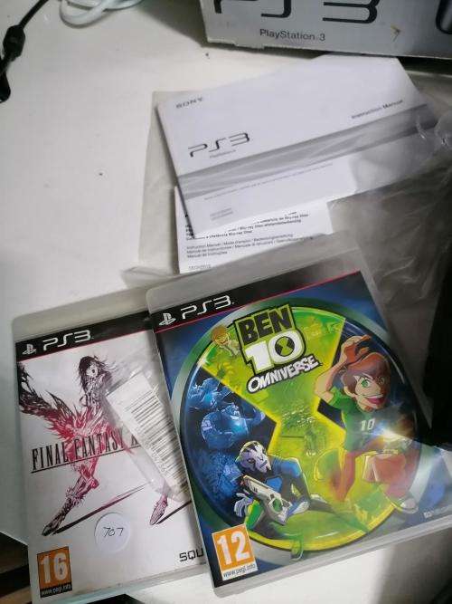 *PREOWNED SONY PLAYSTATION 3 IN BOX WITH 2 GAMES* 1 NEW WIRELESS REMOTE*1 USED REMOTE,MANUALS*