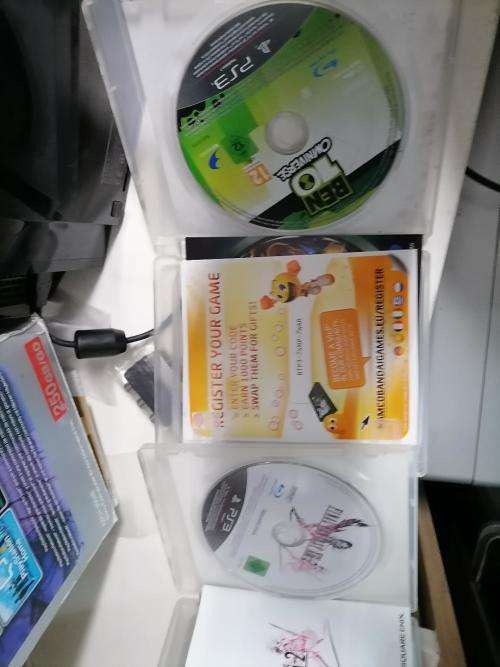 *PREOWNED SONY PLAYSTATION 3 IN BOX WITH 2 GAMES* 1 NEW WIRELESS REMOTE*1 USED REMOTE,MANUALS*