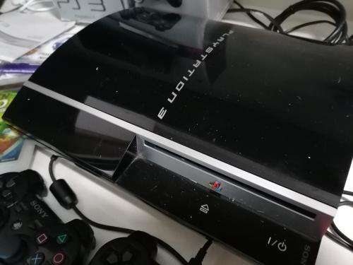 *PREOWNED SONY PLAYSTATION 3 IN BOX WITH 2 GAMES* 1 NEW WIRELESS REMOTE*1 USED REMOTE,MANUALS*