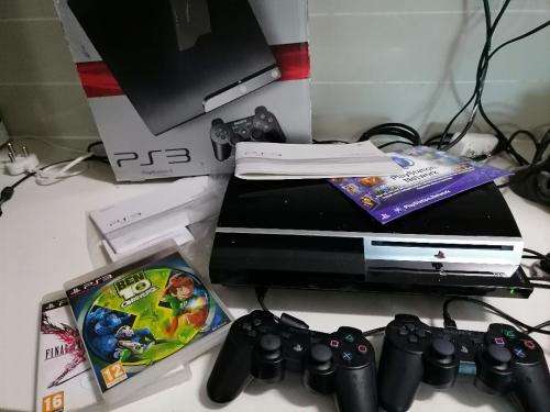 *PREOWNED SONY PLAYSTATION 3 IN BOX WITH 2 GAMES* 1 NEW WIRELESS REMOTE*1 USED REMOTE,MANUALS*