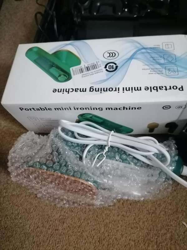 BULK LOT OF UNTESTED ITEMS. ENZO HAIR IRON, FACIAL MASSAGER,IRONING MACHINE,ONE BID FOR THE LOT