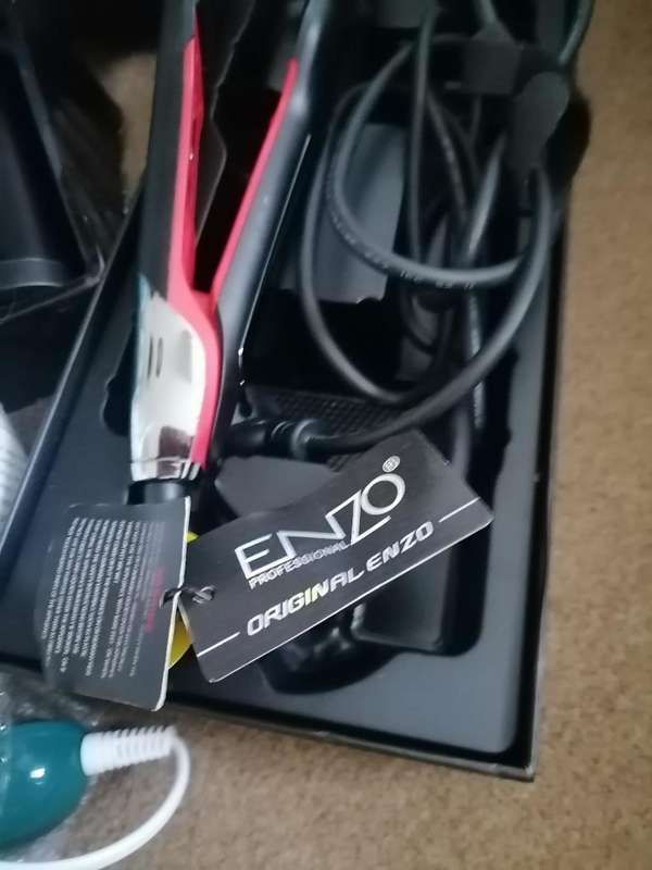 BULK LOT OF UNTESTED ITEMS. ENZO HAIR IRON, FACIAL MASSAGER,IRONING MACHINE,ONE BID FOR THE LOT