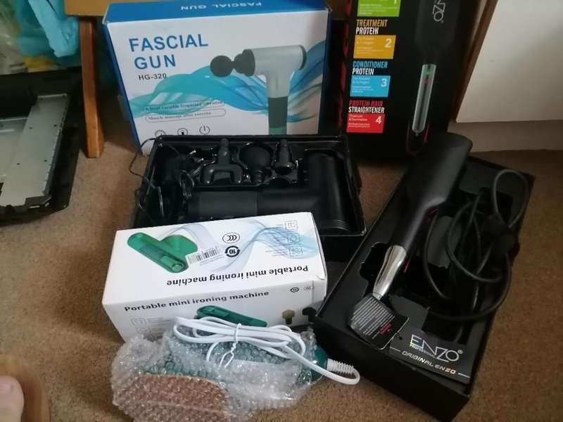 BULK LOT OF UNTESTED ITEMS. ENZO HAIR IRON, FACIAL MASSAGER,IRONING MACHINE,ONE BID FOR THE LOT