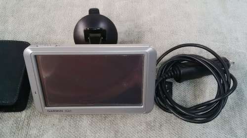 Garmin Nuvi 710 GPS With Window Screen Docking Mount and Charger In Perfect Working Condition