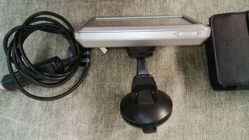 Garmin Nuvi 710 GPS With Window Screen Docking Mount and Charger In Perfect Working Condition