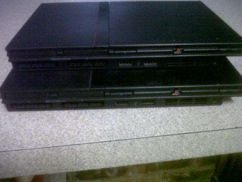 2 x PLAYSTATION 2 CONSOLES BID IS FOR BOTH ** PLEASE READ**