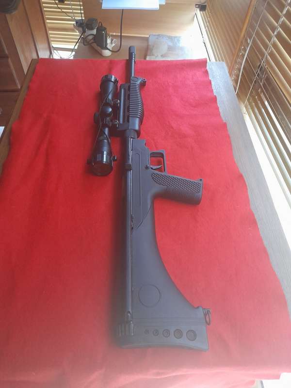 MILITARY STYLED AIR RIFLE WITH SLIDE LEVER COCKING AND AMAZING COMPRESSION