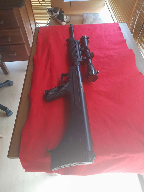 MILITARY STYLED AIR RIFLE WITH SLIDE LEVER COCKING AND AMAZING COMPRESSION