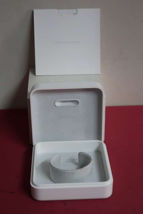 Apple watch 42mm case with all the parts and papers that come with it.