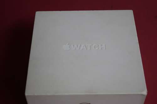 Apple watch 42mm case with all the parts and papers that come with it.