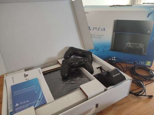 PS4 1TB Console + 2x Dualshock Controllers + Dual Controller Charging Dock