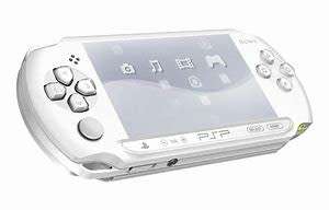 PSP WHITE CONSOLE + CHARGER + 4GB MEMORY CARD + 3 GAMES + 2 MOVIES !!!