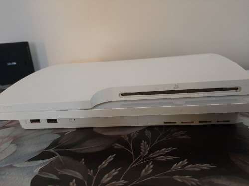 Playstation 3 with 2 controls and 9 games