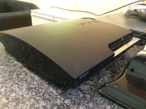 REDUCED Playstation 3 320gb with 3 remotes and 2 random games