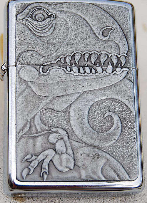 ZIPPO LIGHTER - POLISHED CHROME "DINOSAUR"