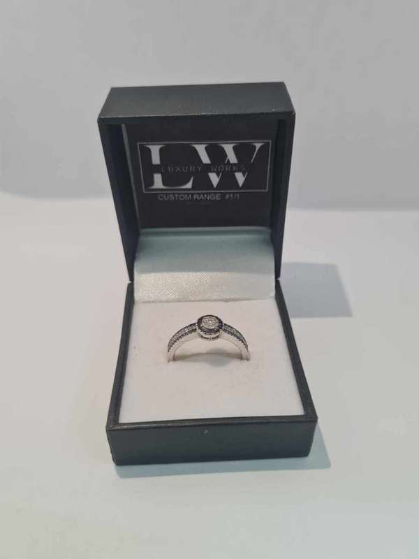 9ct White Gold Halo Black 0.31 ct and White 0.32ct Diamond Ring - Evaluation R27 500