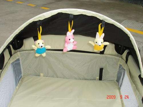 Toy bar (used to help baby lift head to help strengthen neck muscles for when baby starts crawling)